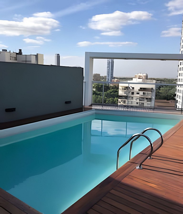 Moderno depto. con vista, piscina, cochera y bici