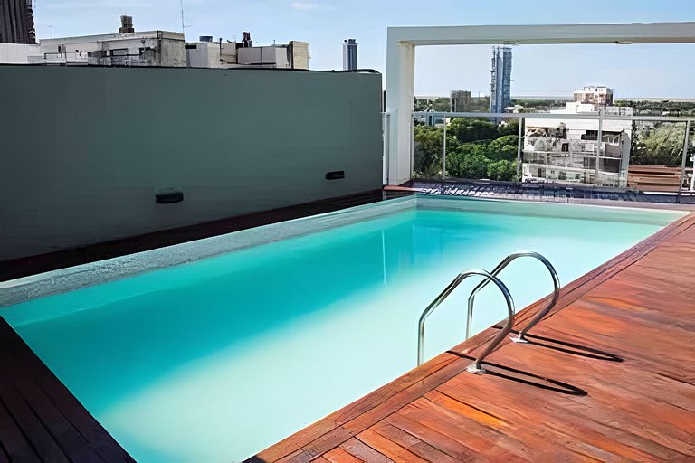 Diseño zen en altura con piscina y cochera